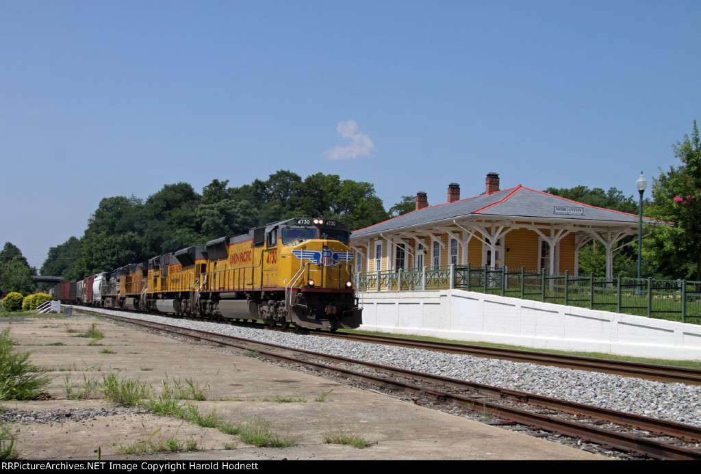 UP 4730 leads NS train 166 eastbound past the station